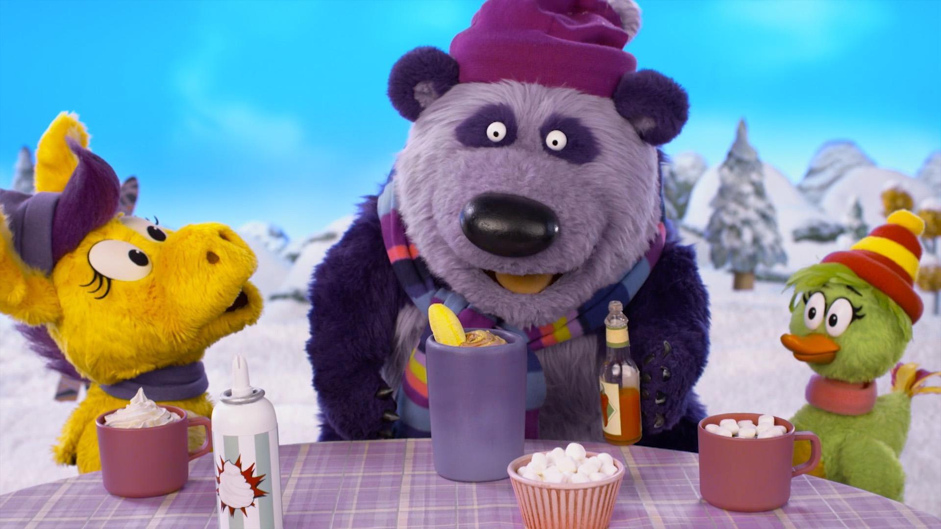 Panda enjoys a snow day his own way./Bob Dog plays Gameshow Gator’s latest snowy game.