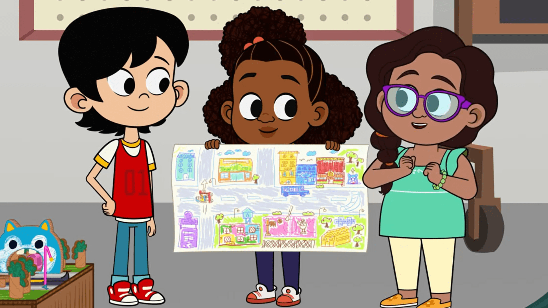 Lyla, Ale, and Everett build a model of their neighborhood for community day.