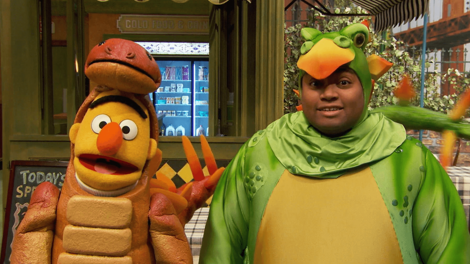 Elmo, Chris, and their friends on Sesame Street have dressed up as dinosaurs.