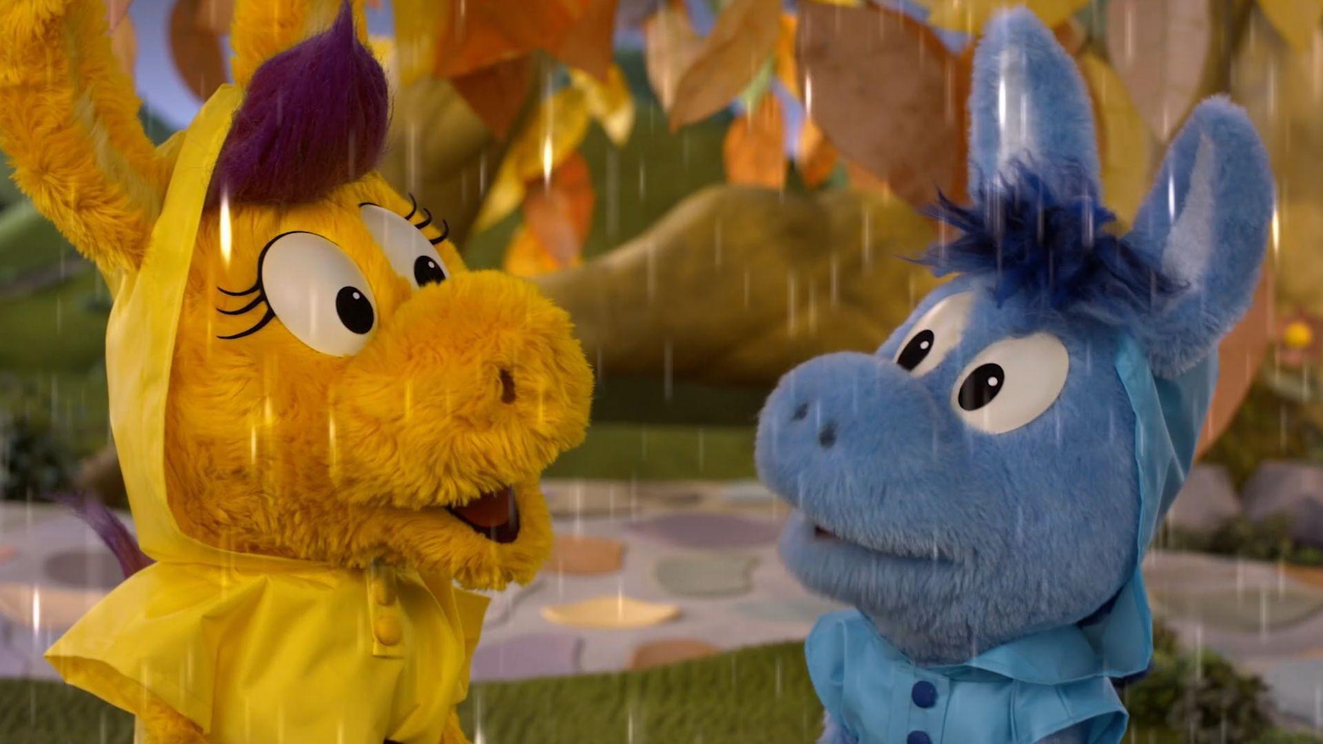 Donkey and Cousin have fun in the rain./Donkey is patient while Cousin learns a new game.