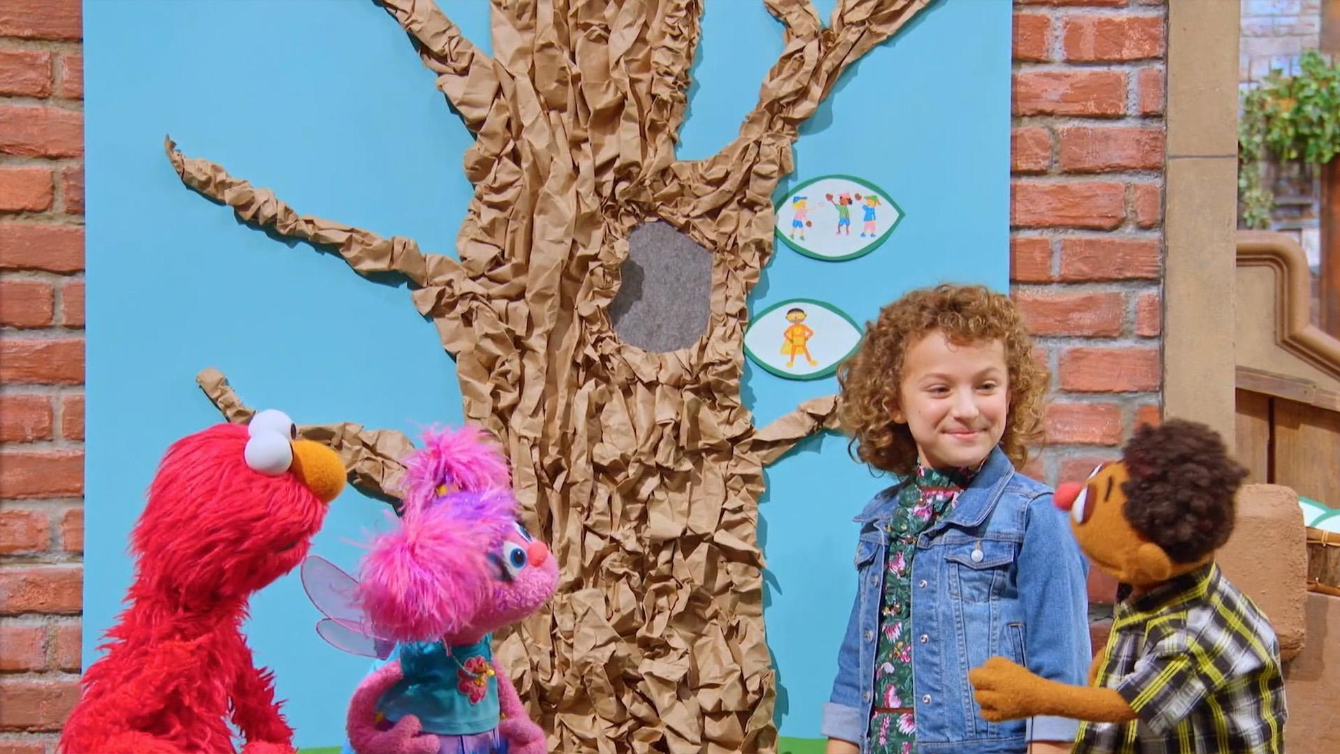 Elmo and his friends are making a Peace Tree to celebrate Martin Luther King Day.
